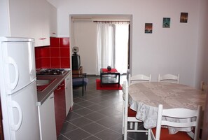 Appartement, 3 chambres | Coin cuisine privé