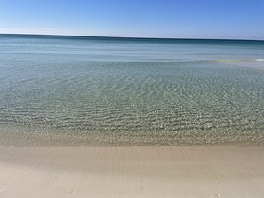 On the beach, sun loungers, beach towels