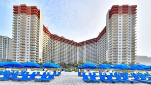 On the beach, sun loungers, beach towels