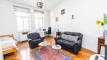 Apartment (3 Bedrooms) | Living room | 43-inch plasma TV with cable channels, TV