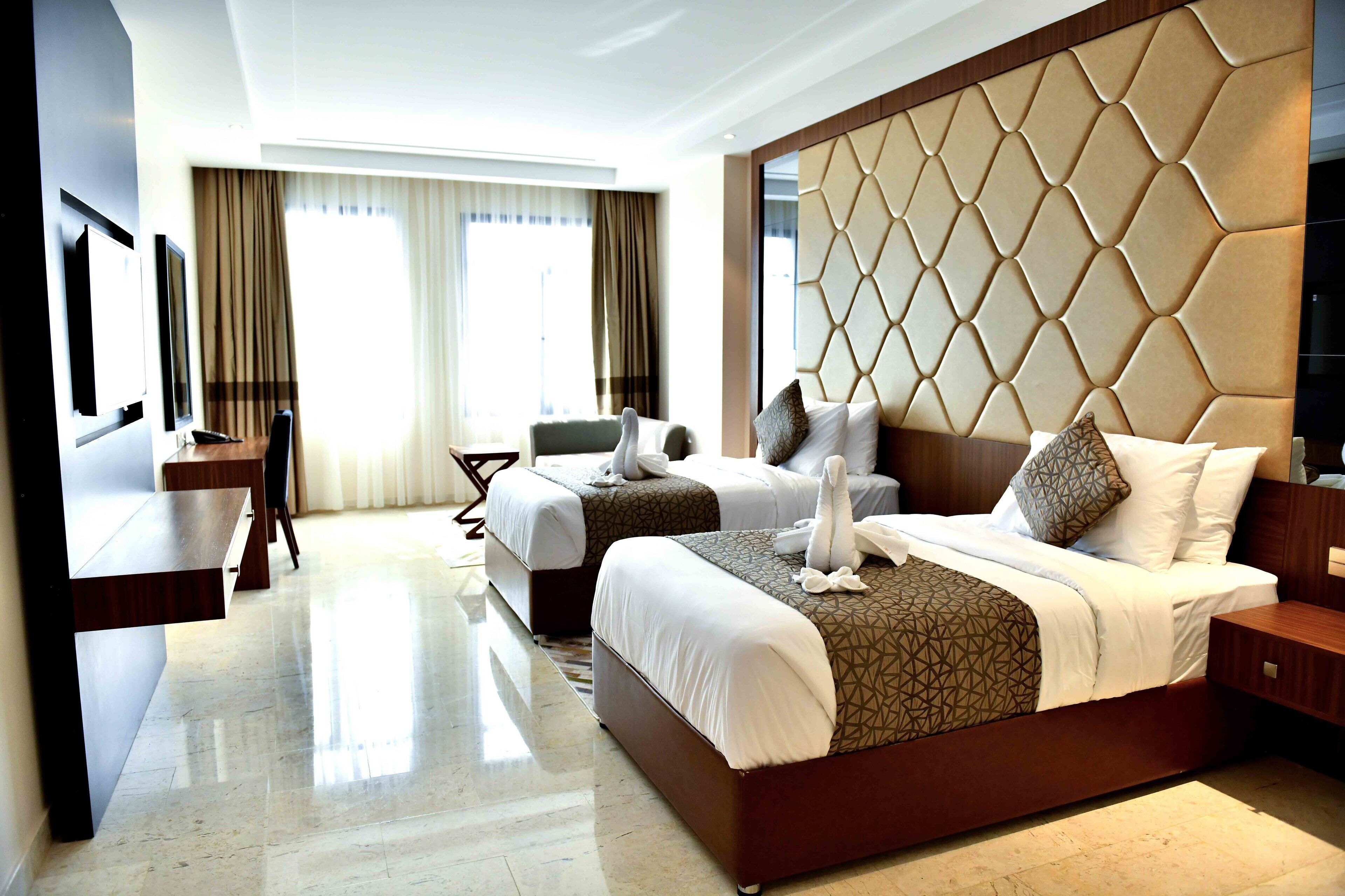 Hypo-allergenic bedding, minibar, in-room safe, desk