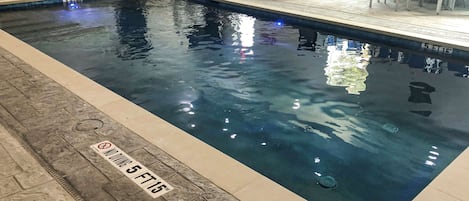 Indoor pool, open 10:00 AM to 10:00 PM, pool loungers