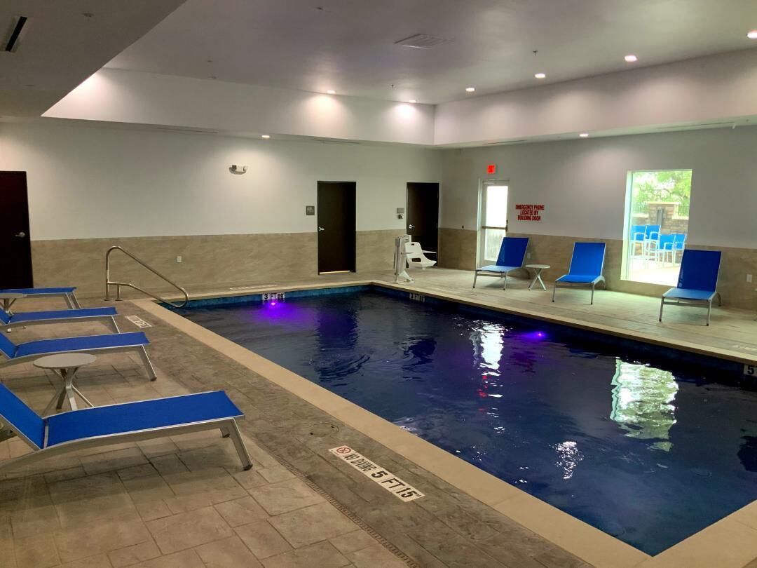 indoor pool, open 10:00 am to 10:00 pm, pool loungers
