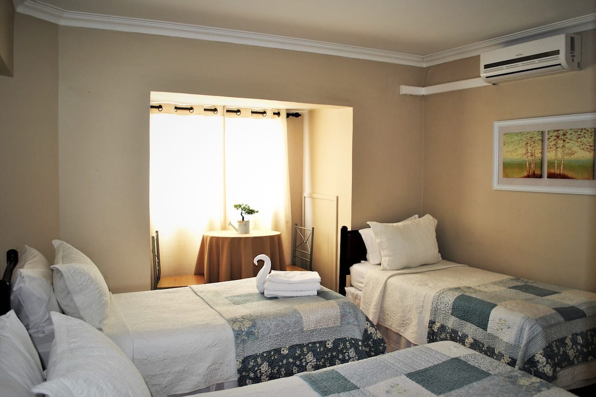 Triple Room, Shared Bathroom | Air conditioning