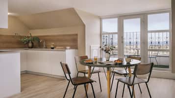 Deluxe Two Bedroom Suite with Balcony | Private kitchen | Fridge, microwave, oven, stovetop
