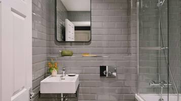 Designer toiletries, hair dryer, towels, soap