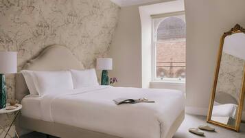 Premium bedding, individually furnished, desk, laptop workspace