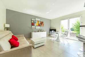 TV - Appartement Villa De L'Arche en plein centre-ville (Andernos-les-Bains)