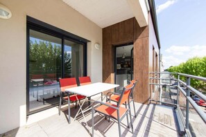 Outdoor dining - Appartement Villa De L'Arche en plein centre-ville (Andernos-les-Bains)