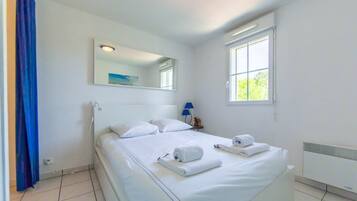 1 chambre, fer et planche Ă repasser, Wi-Fi, draps fournis