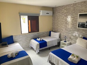 Standard Quadruple Room | Minibar, blackout drapes, free WiFi, bed sheets - Pousada Costera (João Pessoa)