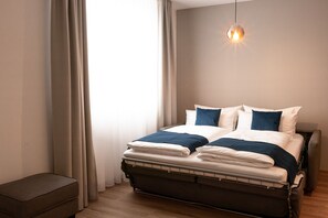 Comfort Suite | Premium bedding, in-room safe, laptop workspace, blackout drapes