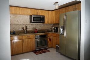 Microwave, blender, cookware/dishes/utensils