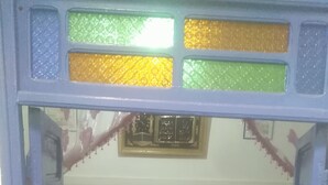 A room with a patterned sofa set, a patterned rug, and a tiled wall. - Typical Riad at motivating price (Marrakech)
