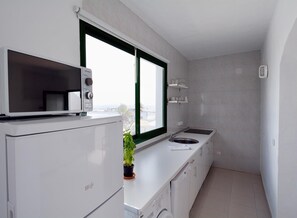 Fridge, microwave, dishwasher, coffee/tea maker