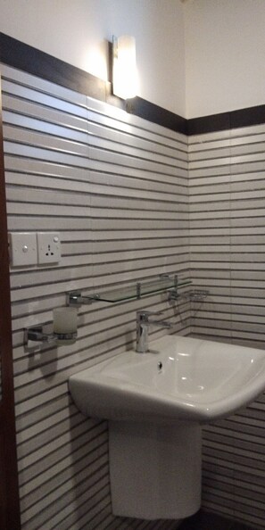 Bathtub, hair dryer, towels