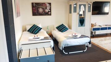 Tabla de planchar con plancha, cuna de viaje y wifi gratis