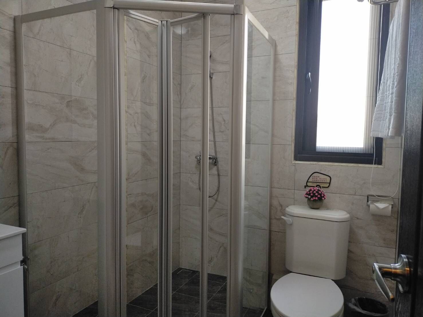 deluxe quadruple room | bathroom | shower, rainfall showerhead, free toiletries, hair dryer