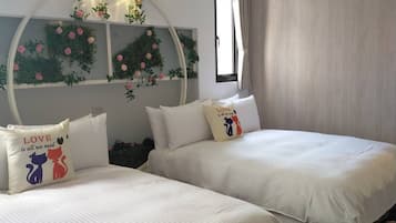 Habitación cuádruple Deluxe | 1 dormitorio, edredones de plumas, decoración individual