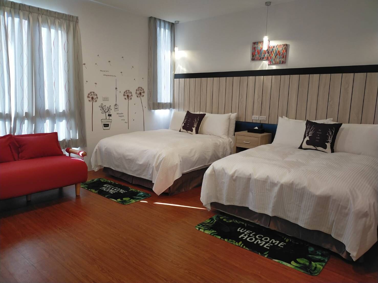 deluxe quadruple room | 1 bedroom, down duvets, individually decorated, individually furnished