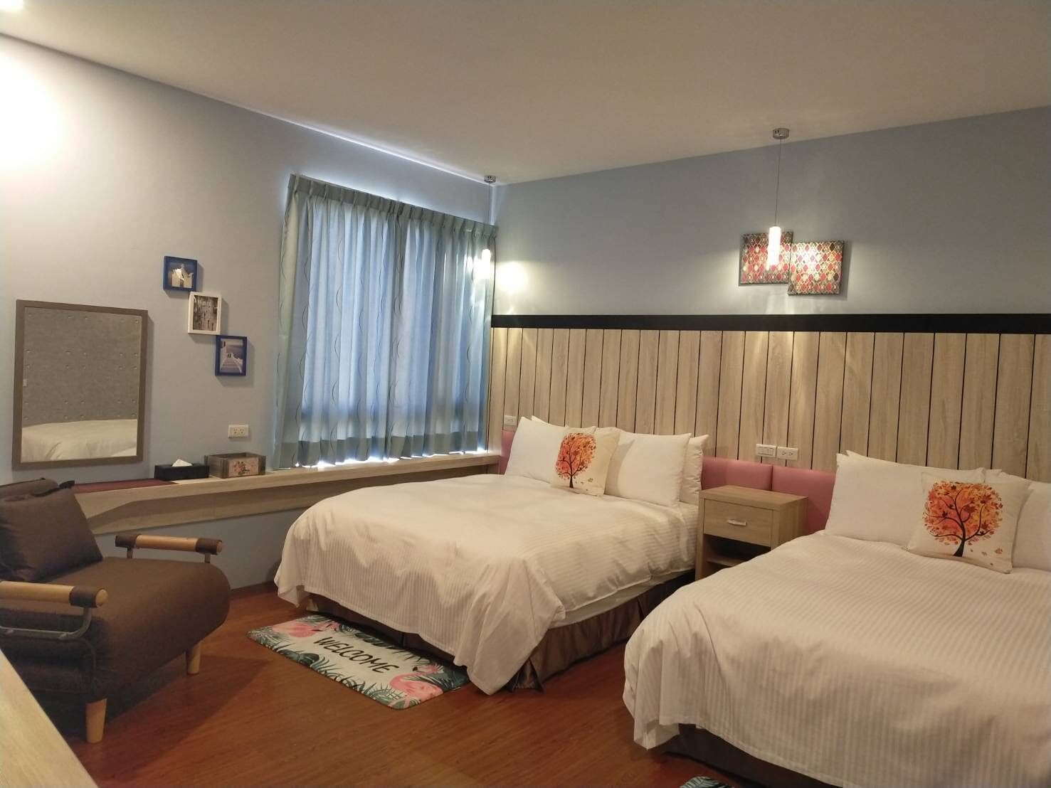 deluxe quadruple room | 1 bedroom, down duvets, individually decorated, individually furnished