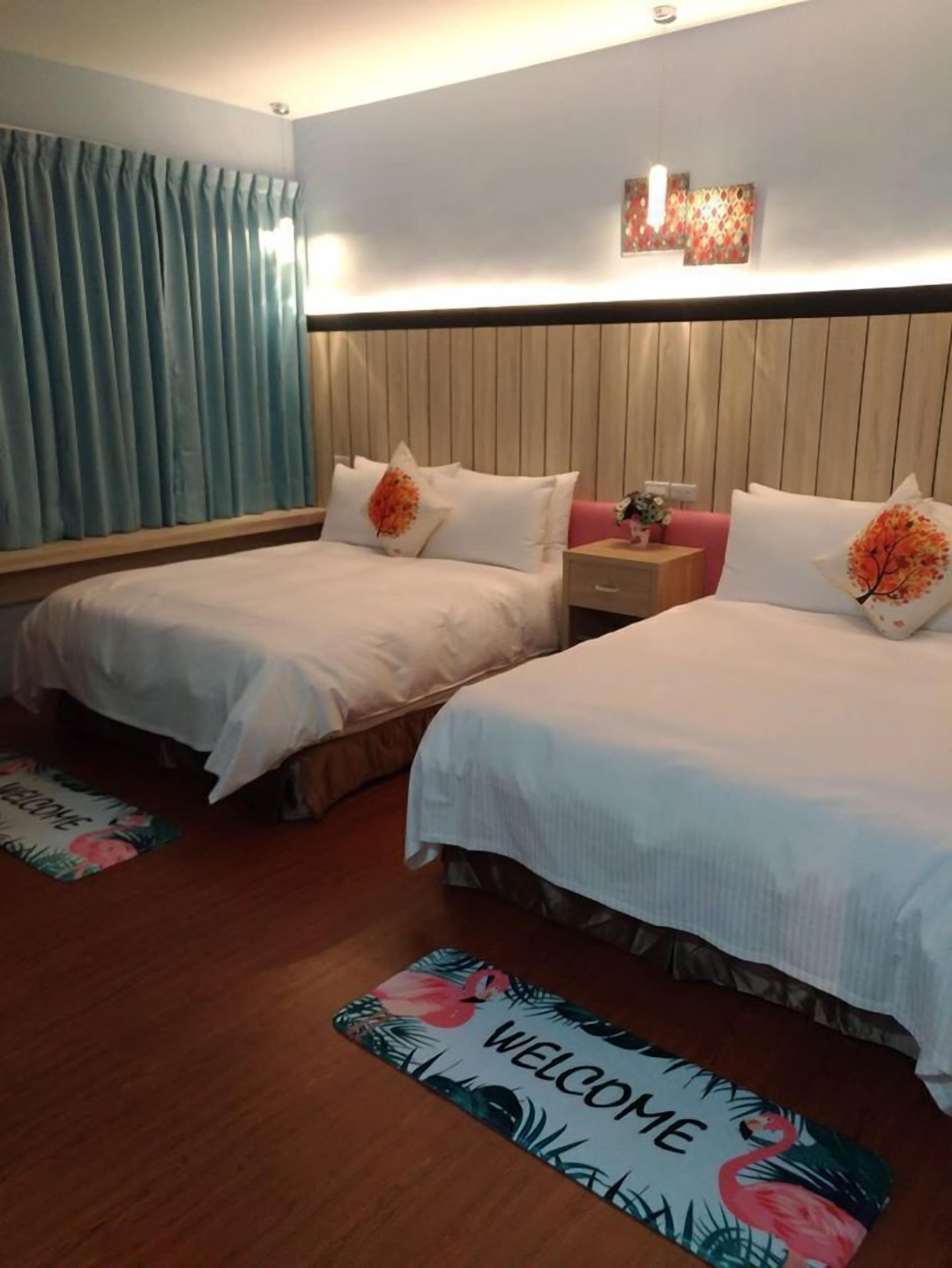 deluxe quadruple room | 1 bedroom, down duvets, individually decorated, individually furnished