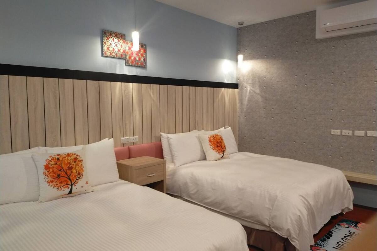 deluxe quadruple room | 1 bedroom, down duvets, individually decorated, individually furnished