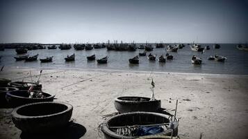 On the beach, sun-loungers, beach towels