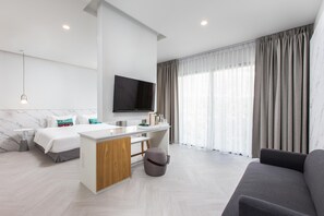 Deluxe B | Área de sala de estar | Televisión LED 