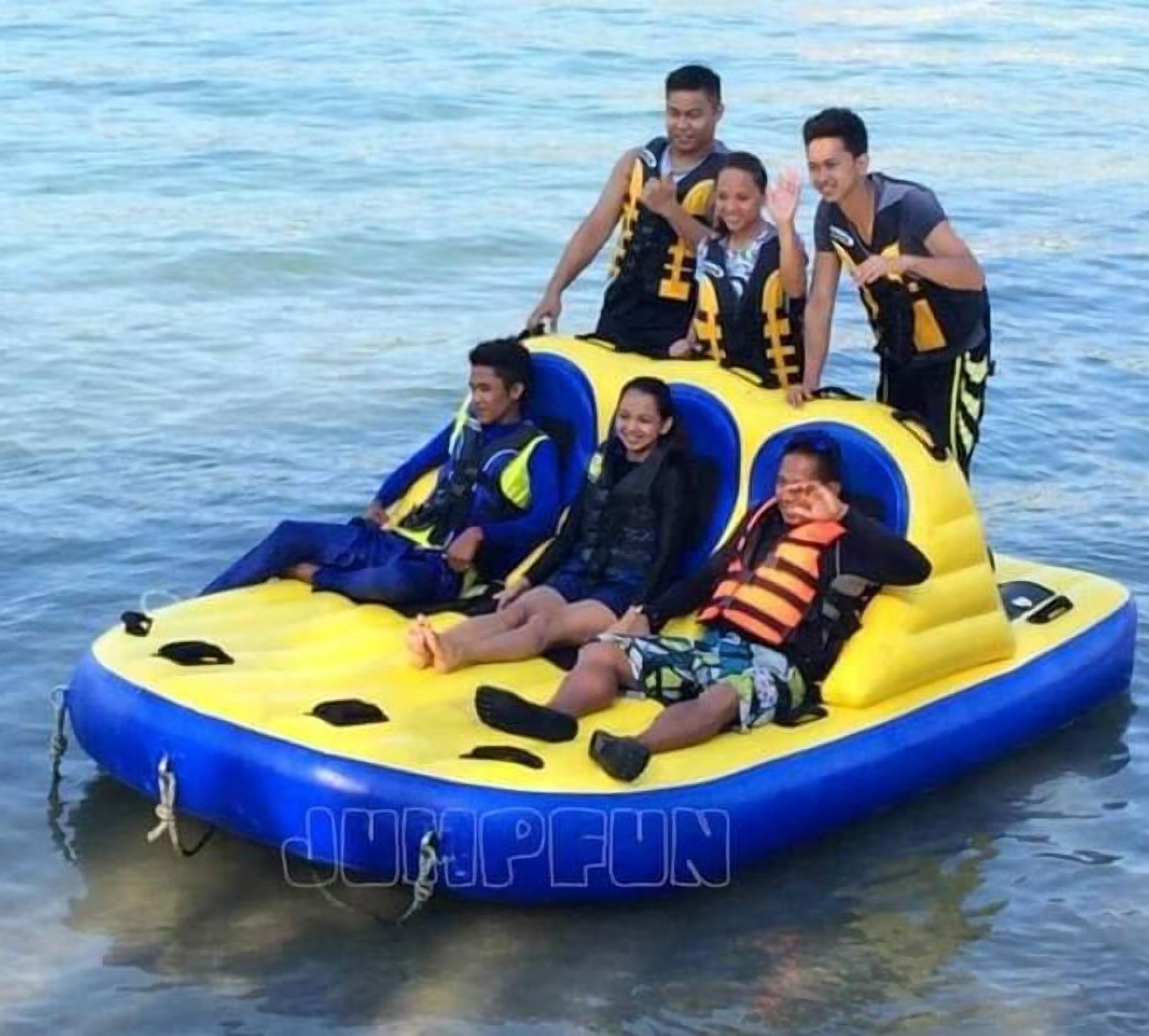A group of people on a blue and yellow inflatable raft.