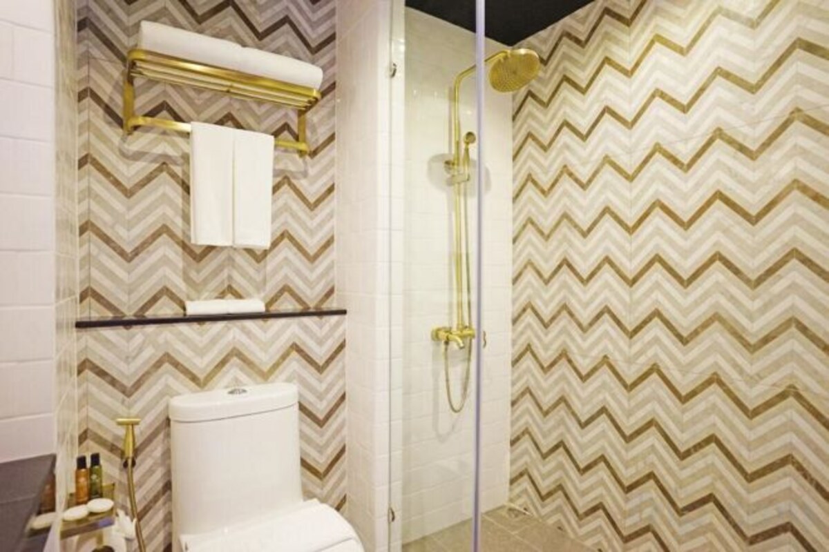 Bathroom | Jetted tub, rainfall showerhead, hair dryer, bidet