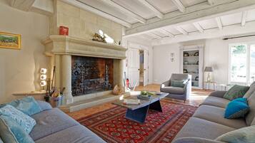 Smart TV, DVD player, table football, books