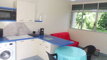 Fridge, microwave, stovetop, coffee/tea maker