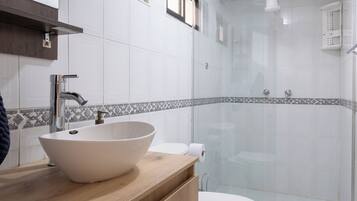 Hair dryer, towels, soap, shampoo