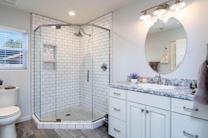 Shower, hair dryer, towels, soap