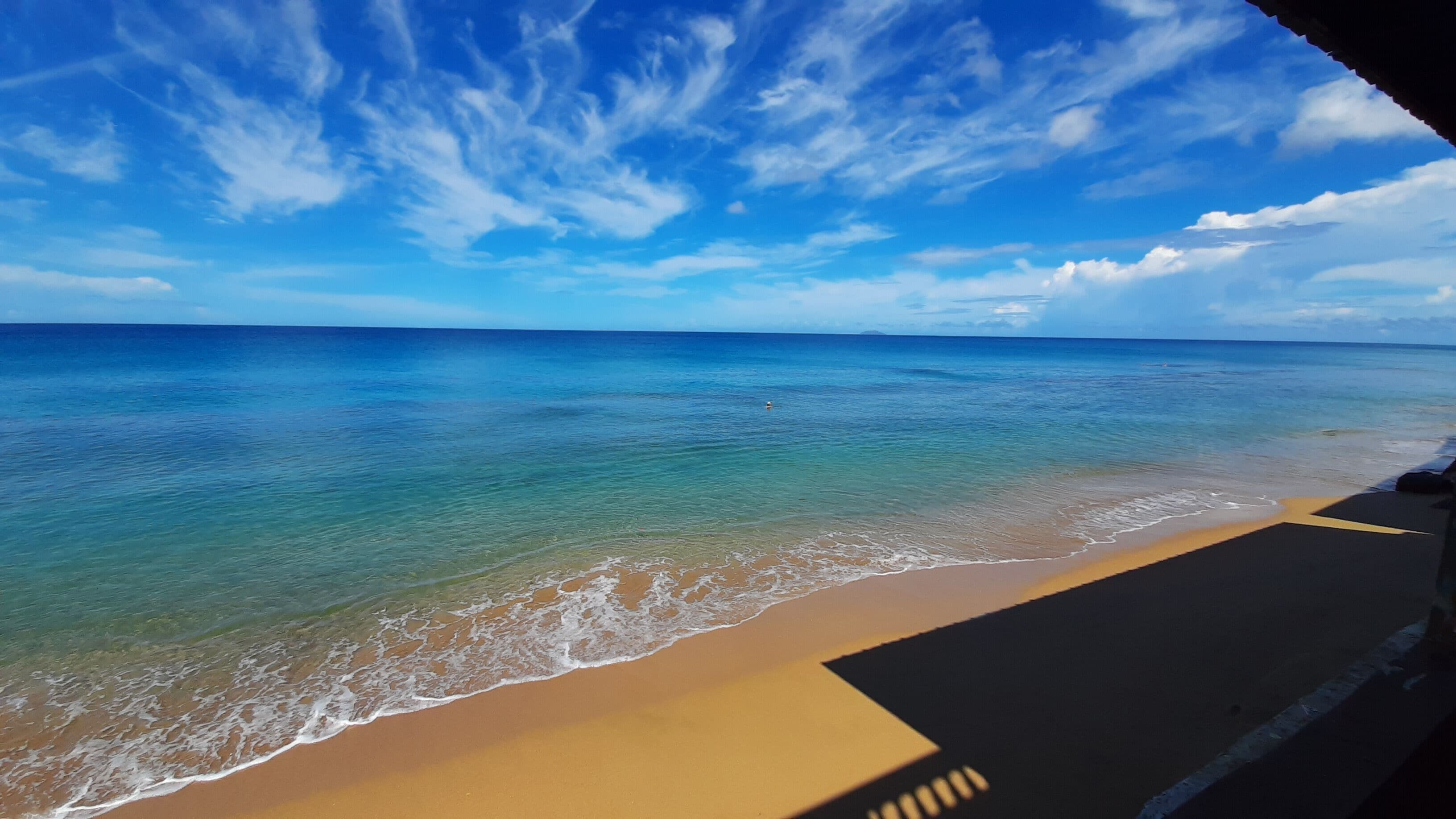 On the beach, white sand, beach towels, snorkelling