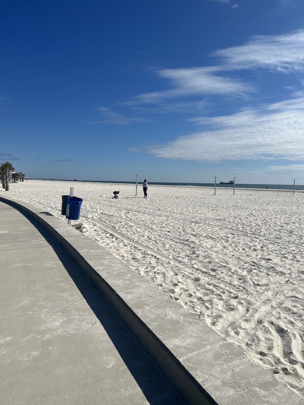 On the beach, sun-loungers