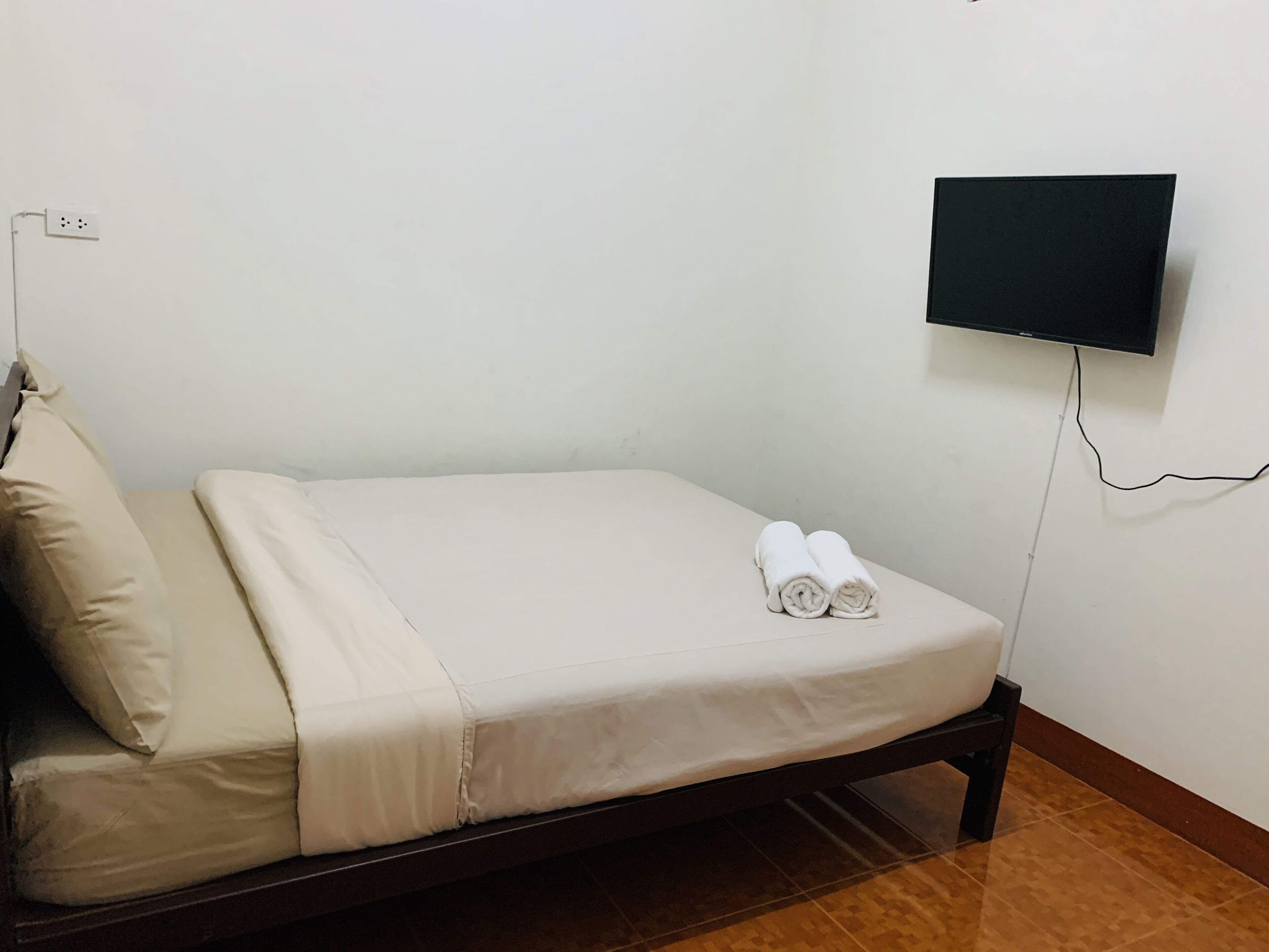 Individually decorated, individually furnished, desk, rollaway beds