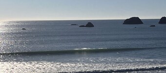 Oceanfront, Amazing Sunsets, Whales, Surfing, Biking, Short walk to beach