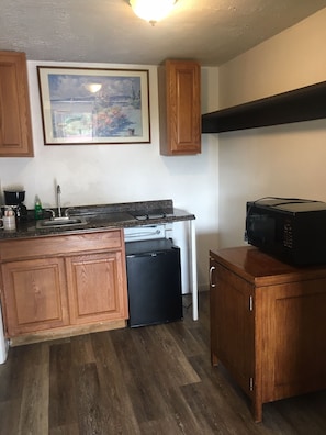 Fridge, microwave, stovetop, coffee/tea maker