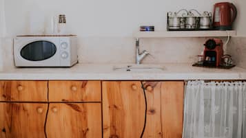 Deluxe Studio Suite | Private kitchenette | Full-sized fridge, microwave, stovetop, espresso maker