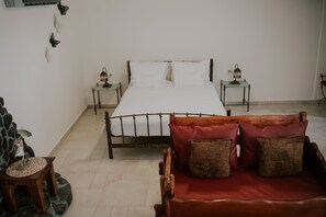 Individually decorated, blackout drapes, iron/ironing board