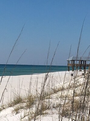 On the beach, sun loungers, beach towels