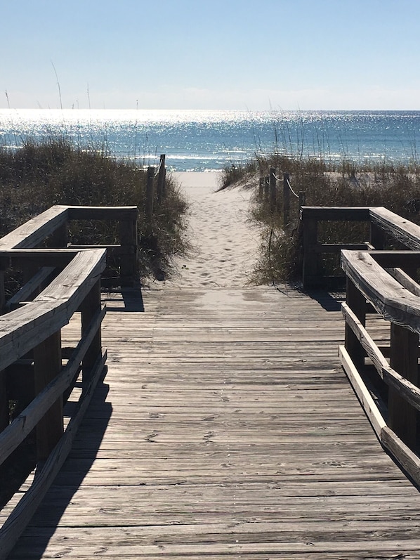 On the beach, sun loungers, beach towels