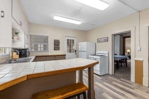 Open kitchen with breakfast bar