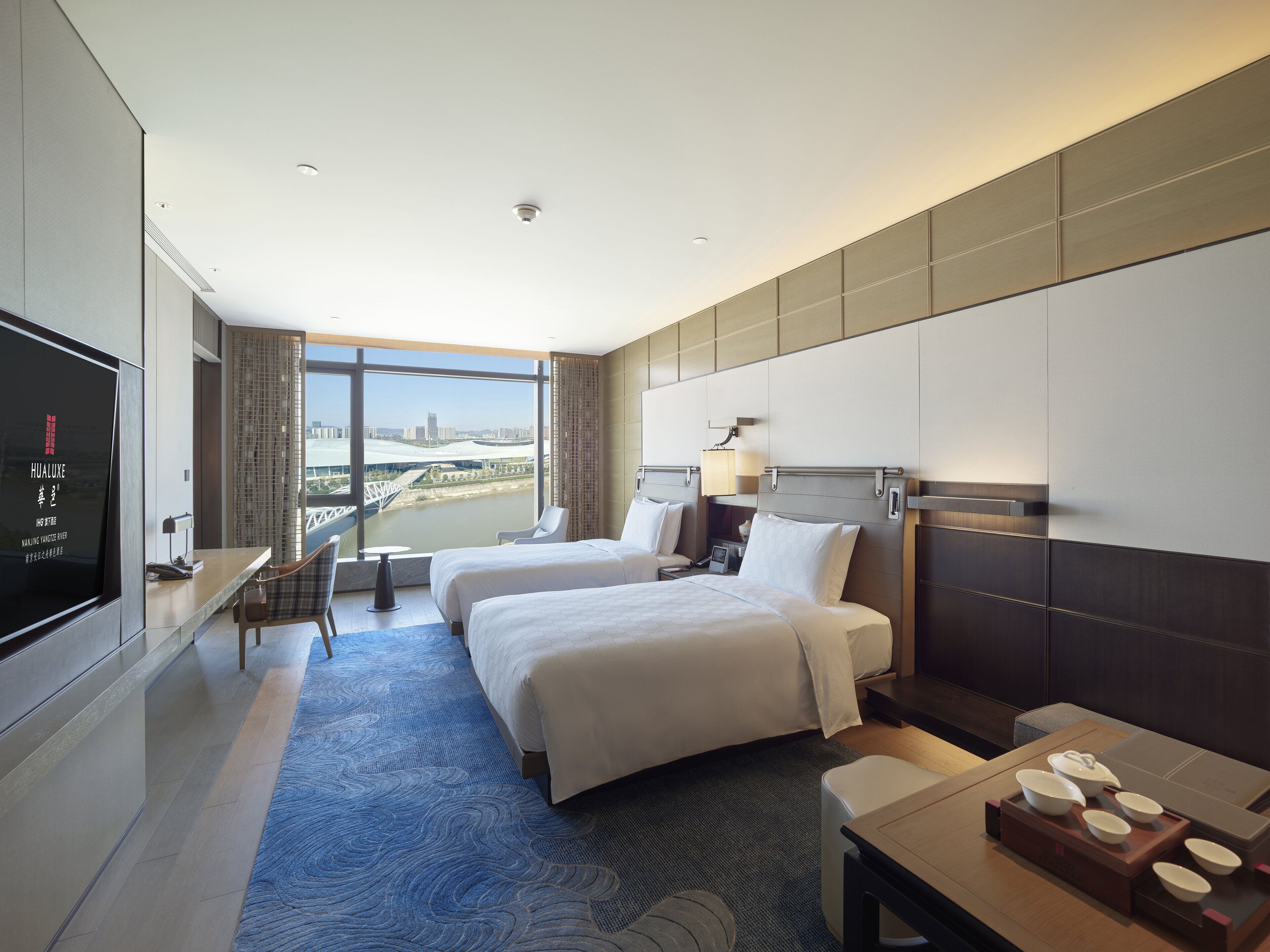 Premium bedding, down comforters, free minibar items, in-room safe