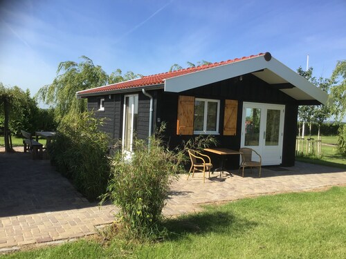 Passez la nuit sur l'eau dans Tiny House / Trekkershut Comfort / Mini Bungalow