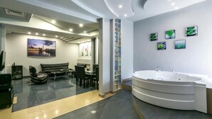 Luxury Quadruple Room, 2 Queen Beds | Living area | 32-inch LCD TV with cable channels, TV - Best Hotel Yerevan (Yerevan)