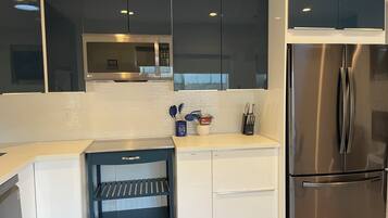 Fridge, microwave, dishwasher, coffee/tea maker