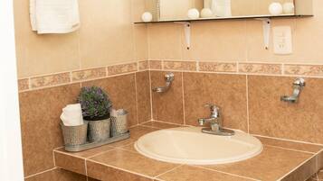 Shower, towels, soap, shampoo